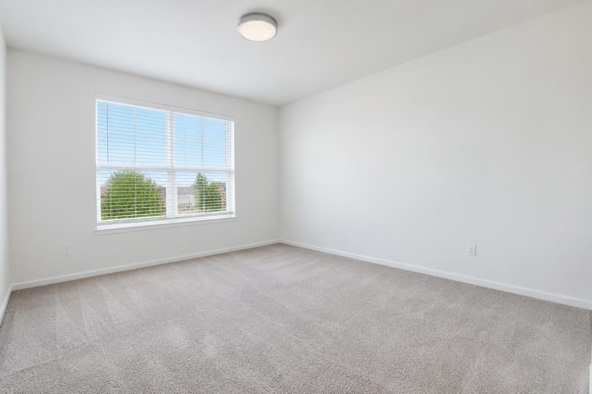 Illustrative freshly cleaned apartment bedroom